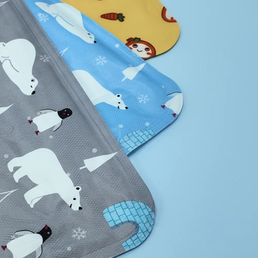 Pet Cooling Mats with polar bear patterns on a blue background